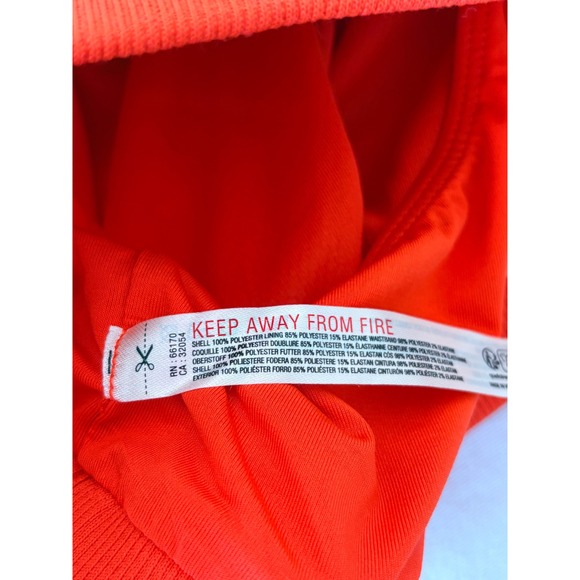 Free People Movement Orange  Dolphin Shorts White Trim Womens Size Medium new - Picture 7 of 8